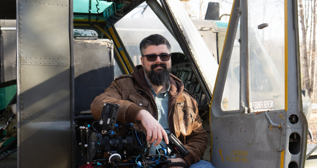 Jacob Whiley filming on the helicopter gunship Croc 4